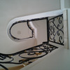 ロートアイアンによる螺旋階段の装飾手摺
